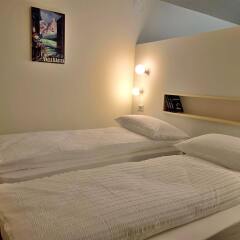Отель Apartements Coeur de Ville Аоста сейф в номере