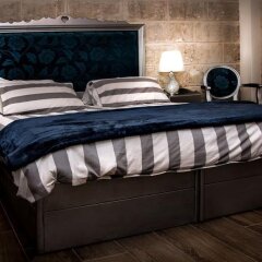 Отель Luciano Al Porto Boutique Accommodation Валетта комната для гостей фото 4