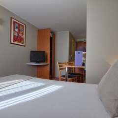 Отель Timhotel Nation сейф в номере