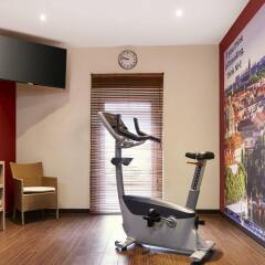 Отель NH Wien City фитнесс-зал фото 2