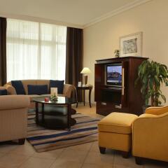 Отель Beach Rotana All Suites интерьер отеля фото 2