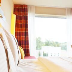 Отель Holiday Inn Express Zurich Airport Швейцария, Рюмланг - 1 отзыв об отеле, цены и фото номеров - забронировать отель Holiday Inn Express Zurich Airport онлайн комната для гостей фото 2