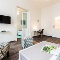 Апартаменты Holiday & Business Apartments Vienna Вена комната для гостей фото 4