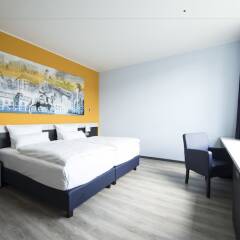 Отель carathotel Düsseldorf City комната для гостей фото 3