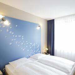 H2 Hotel Berlin Alexanderplatz комната для гостей