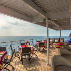 Отель Four Seasons Resort Maldives at Kuda Huraa гостиничный бар