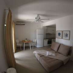 Отель Moriel Seaside Homes Suites Ситония комната для гостей