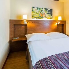 Отель Radisson Hotel Kaunas Литва, Каунас - 1 отзыв об отеле, цены и фото номеров - забронировать отель Radisson Hotel Kaunas онлайн комната для гостей фото 2