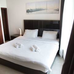 Отель HiGuests Vacation Homes - Burj Views Дубай комната для гостей фото 3