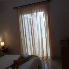 Апартаменты Sunset Relax Apartments комната для гостей фото 3