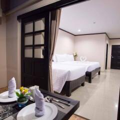 Отель Golden Tulip Essential Pattaya в номере фото 2