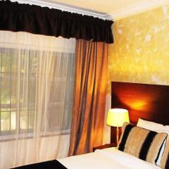 Protea Hotel Apo Apartments комната для гостей