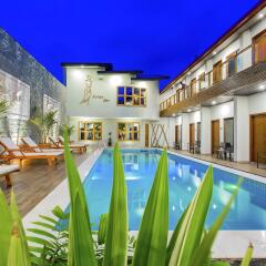 Отель Kaani Village & Spa бассейн