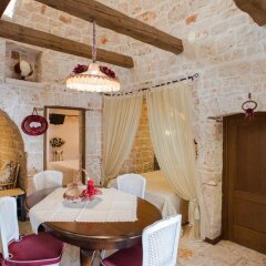 Отель Romantic Trulli Альберобелло питание