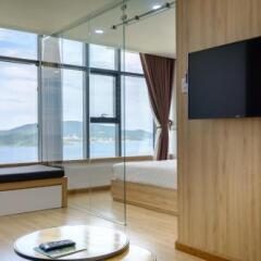 Апартаменты Sunrise Ocean View Apartment Студия с различными типами кроватей фото 19