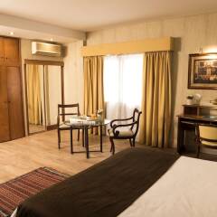 Отель Mayflower Suites комната для гостей фото 3