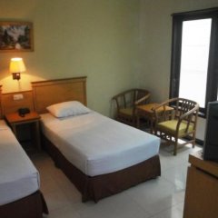 Hotel Wisata in Gorontalo, Indonesia from 18$, photos, reviews - zenhotels.com guestroom photo 5