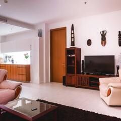 Апартаменты Luxury Apartments NorthPoint Pattaya by GrandisVillas Паттайя комната для гостей
