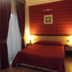 Hotel Hermitage Куальяно комната для гостей