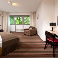 Отель Leonardo Inn Airport Hamburg Гамбург удобства в номере