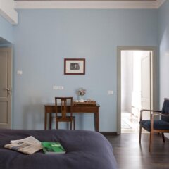 Отель Appartamento Santi Quattro 1 E 2 Colosseo комната для гостей фото 5
