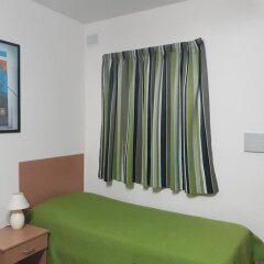 Апартаменты The Seven Apartments Сан Джулианс комната для гостей