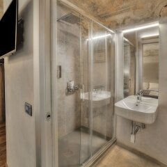 Отель Stone Walls Deluxe ванная