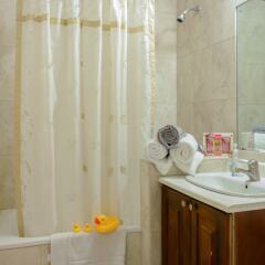 Отель SandCastles Deluxe Beach Resort ванная фото 2