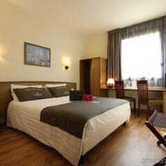 Отель Tulip Inn Padova Падуя сейф в номере
