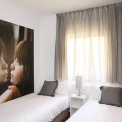 Апартаменты MH Apartments Suites комната для гостей