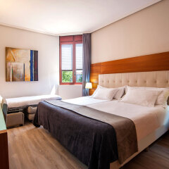 Hotel Silken Amara Plaza комната для гостей