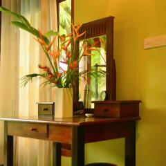 Отель Tropical Retreat удобства в номере