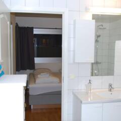 Отель Tromsø Apartments Норвегия, Тромсе - отзывы, цены и фото номеров - забронировать отель Tromsø Apartments онлайн ванная фото 2