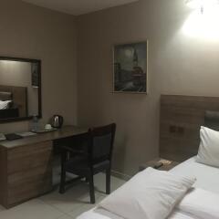 Nondon International Hotel Энугу удобства в номере