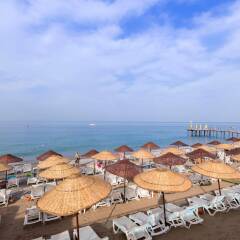 Holiday Park Resort Турция, Окурджалар - отзывы, цены и фото номеров - забронировать отель Holiday Park Resort онлайн пляж фото 2