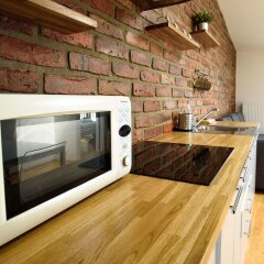 Апартаменты Downtown Apartments удобства в номере фото 2