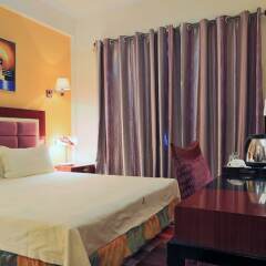 Hotel Roma Ritz Huambo в номере фото 2