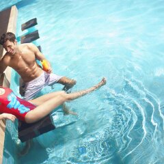 Отель Beach Rotana All Suites бассейн фото 3