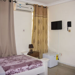 At Home Boutique Hostel and Suite удобства в номере фото 2