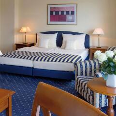 Victor's Residenz Hotel Leipzig Лейпциг комната для гостей фото 2