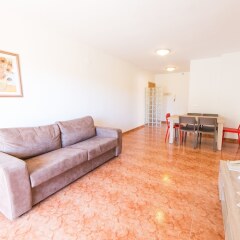 Отель Apartamentos Palas Pineda Испания, Ла Пинеда - отзывы, цены и фото номеров - забронировать отель Apartamentos Palas Pineda онлайн комната для гостей