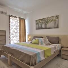 Апартаменты First Class Apartments Calleja by G&G комната для гостей
