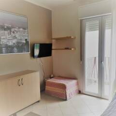 Апартаменты Residence 1 Uno Studio & Suites Римини удобства в номере фото 2