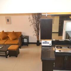Отель Lancaster Hotel Cebu Филиппины, Лапу-Лапу - отзывы, цены и фото номеров - забронировать отель Lancaster Hotel Cebu онлайн комната для гостей