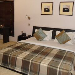 Отель Pearl Manor Luxury Suites комната для гостей