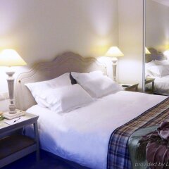 Отель Royal Hotel Paris Champs Elysées Франция, Париж - отзывы, цены и фото номеров - забронировать отель Royal Hotel Paris Champs Elysées онлайн комната для гостей