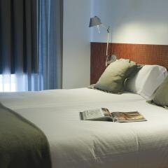 Отель MH Apartments Barcelona Испания, Барселона - отзывы, цены и фото номеров - забронировать отель MH Apartments Barcelona онлайн комната для гостей фото 2