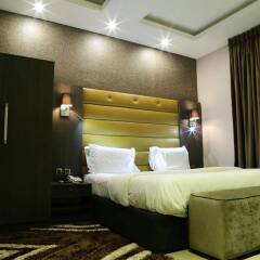 Отель Golden Tulip Essential Benin City комната для гостей фото 3