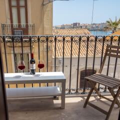 Апартаменты La Riviera apartment by Dimore in Sicily Сиракуза балкон