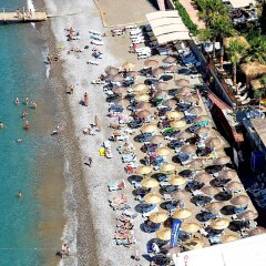 Holiday Garden Resort Турция, Окурджалар - отзывы, цены и фото номеров - забронировать отель Holiday Garden Resort онлайн пляж фото 2